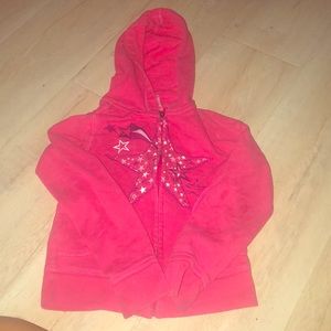 Pink Jacket with star prints on it